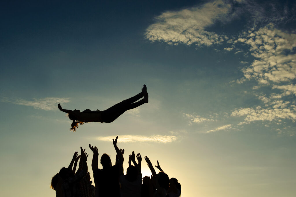 Group,Throwing,Girl,In,The,Air, Mediationstraining